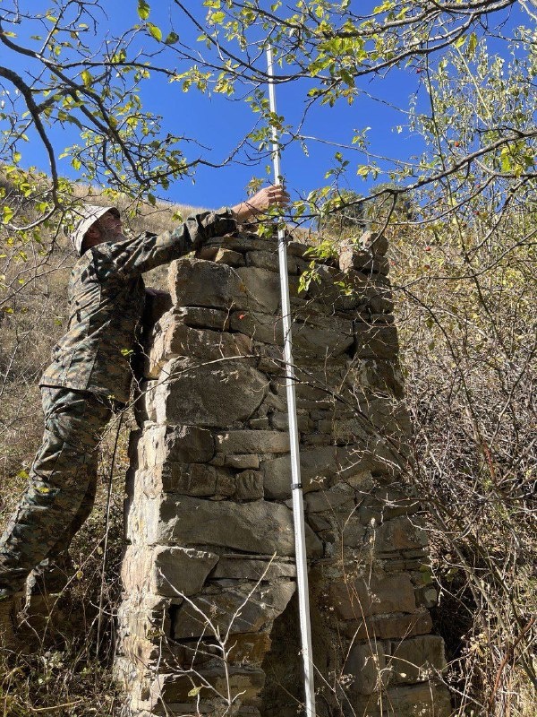 Employees of the Dzheyrah-Assinsky Museum-Reserve carried out planned work on accounting and fixation of previously unrecorded objects of cultural heritage.

This time the trip was made to the rarely visited tower complex in the eastern part of the Guloikhi Gorge - "Besht", where the ruins of four residential towers are preserved.

The described monument - a pillar-shaped sanctuary or, as it is popularly called, sieling - is located 300 meters west of the complex. Its height is 2.50 m, length is 1.10 m, width is 0.65 m. Below, on the facade of the object there is a lancet beggar with a height of 0.8 m.

In his studies, the Ingush historian and archaeologist M.B. Muzhukhoev believed that pillar-shaped sanctuaries complete the evolution of local religious monuments. And some scientists, on the contrary, believe that pillar-shaped structures are the primary form of religious buildings.

M.B. Musukhoev also claims that the construction of sielings was performed in memory of deceased ancestors. These monuments served as a symbol of veneration and respect for ancestors, and were believed to provide invisible protection to their descendants.

Ethnographic descriptions acquaint us with monolithic "pillars" - sanctuaries known as "Sielings", indicating their mythological connection with the cult of "the sun god" and lightning "Selya". A typical example of the sanctuary-monument is the sielings near the village of Erzi, Egikal, Targim, Niy, Vovnushki, Ozdeche, etc. in Ingushetia.

Researcher F.M. Kostoeva believes that in ancient times, the term "seeling" was used to refer to a high quadrangular stone column facing south, with a flat or gable top and a small niche at the base. The sielings were collected from raw stone before human growth and fixed to a lime or clay solution ("markhal"). Such stone structures were erected at crossroads, at towers or crypts.

As for this structure, we did not find its description in any written source. Employees carried out measurements of the object, photofixation. The monument will be included in the list of identified objects of cultural heritage of the republic, as well as put into scientific circulation, and it will be of interest to all who are interested in the history of Ingushetia.