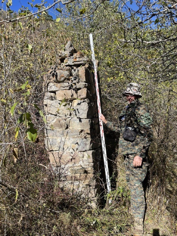 Employees of the Dzheyrah-Assinsky Museum-Reserve carried out planned work on accounting and fixation of previously unrecorded objects of cultural heritage.

This time the trip was made to the rarely visited tower complex in the eastern part of the Guloikhi Gorge - "Besht", where the ruins of four residential towers are preserved.

The described monument - a pillar-shaped sanctuary or, as it is popularly called, sieling - is located 300 meters west of the complex. Its height is 2.50 m, length is 1.10 m, width is 0.65 m. Below, on the facade of the object there is a lancet beggar with a height of 0.8 m.

In his studies, the Ingush historian and archaeologist M.B. Muzhukhoev believed that pillar-shaped sanctuaries complete the evolution of local religious monuments. And some scientists, on the contrary, believe that pillar-shaped structures are the primary form of religious buildings.

M.B. Musukhoev also claims that the construction of sielings was performed in memory of deceased ancestors. These monuments served as a symbol of veneration and respect for ancestors, and were believed to provide invisible protection to their descendants.

Ethnographic descriptions acquaint us with monolithic "pillars" - sanctuaries known as "Sielings", indicating their mythological connection with the cult of "the sun god" and lightning "Selya". A typical example of the sanctuary-monument is the sielings near the village of Erzi, Egikal, Targim, Niy, Vovnushki, Ozdeche, etc. in Ingushetia.

Researcher F.M. Kostoeva believes that in ancient times, the term "seeling" was used to refer to a high quadrangular stone column facing south, with a flat or gable top and a small niche at the base. The sielings were collected from raw stone before human growth and fixed to a lime or clay solution ("markhal"). Such stone structures were erected at crossroads, at towers or crypts.

As for this structure, we did not find its description in any written source. Employees carried out measurements of the object, photofixation. The monument will be included in the list of identified objects of cultural heritage of the republic, as well as put into scientific circulation, and it will be of interest to all who are interested in the history of Ingushetia.